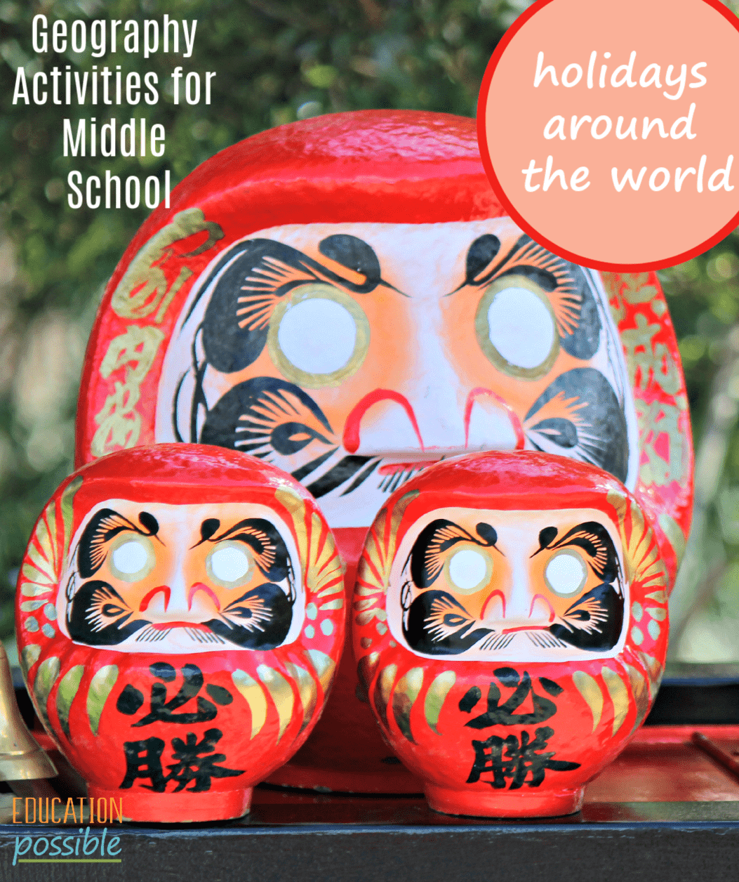 One large and two small daruma dolls.