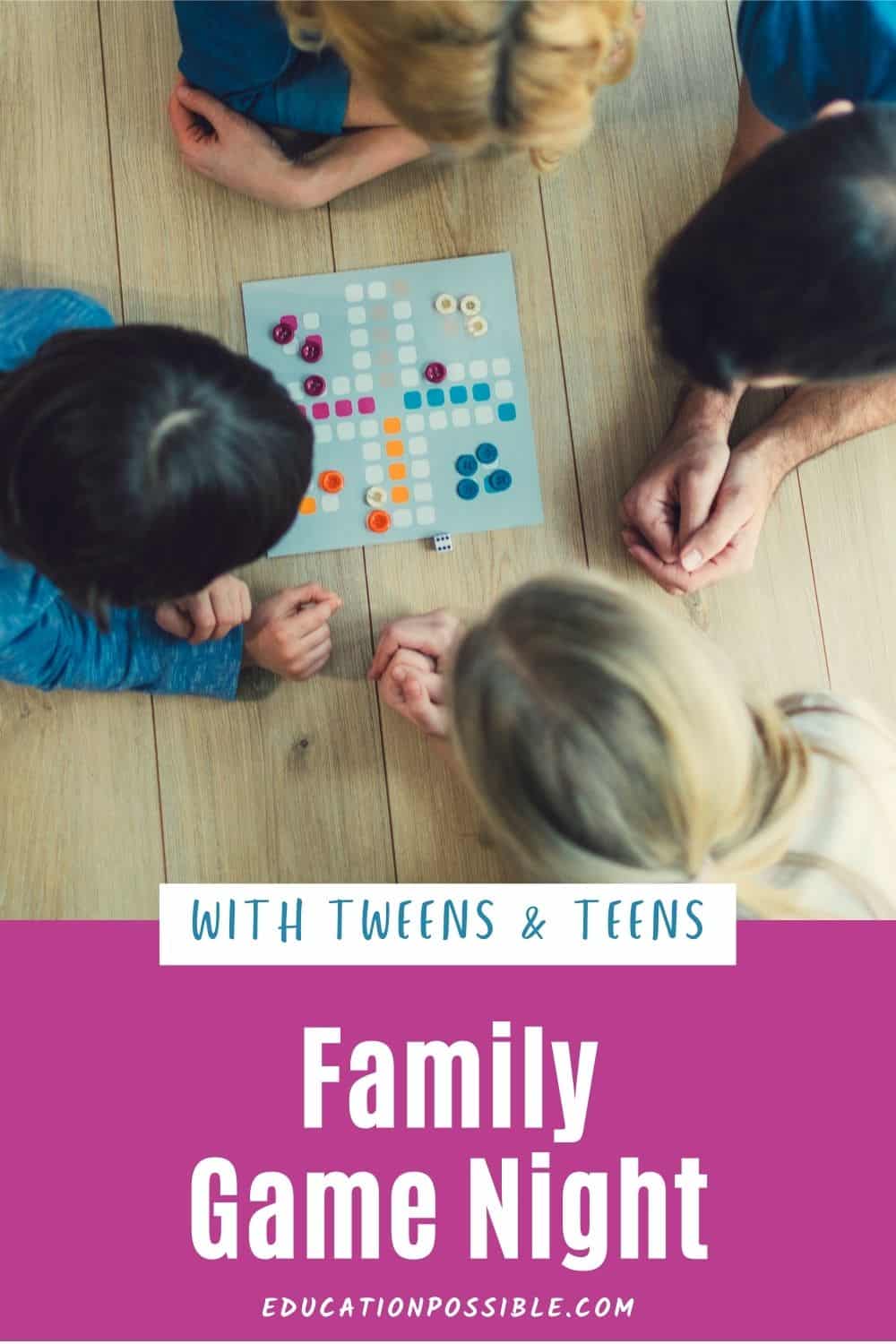 Overhead image of four members of a family playing a board game.