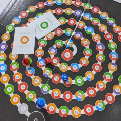 Overhead shot of the Prime Climb Board Game set up in the middle of play.