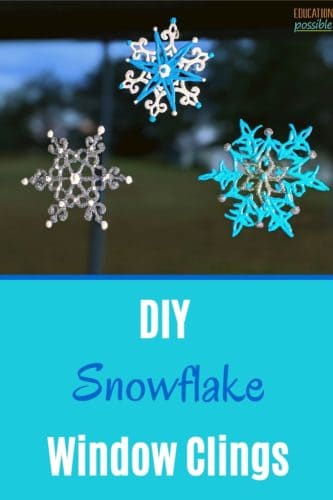 DIY snowflake window clings (blue, white, and silver) stuck to a sliding glass door.