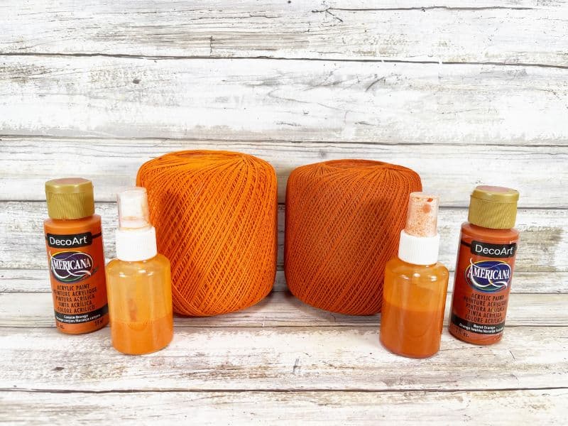 Use a spray bottle filled with orange paint to color thread for pumpkins