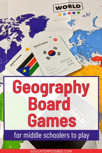 Close up of The World Game being played. South Korea and South Sudan country cards lying on the colorful foldable map. Text overlay.