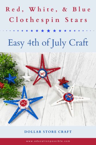 Red, white, and blue clothespin stars craft with a felt circle, button, and twine bow in the middle laying on a white washed table in the background.