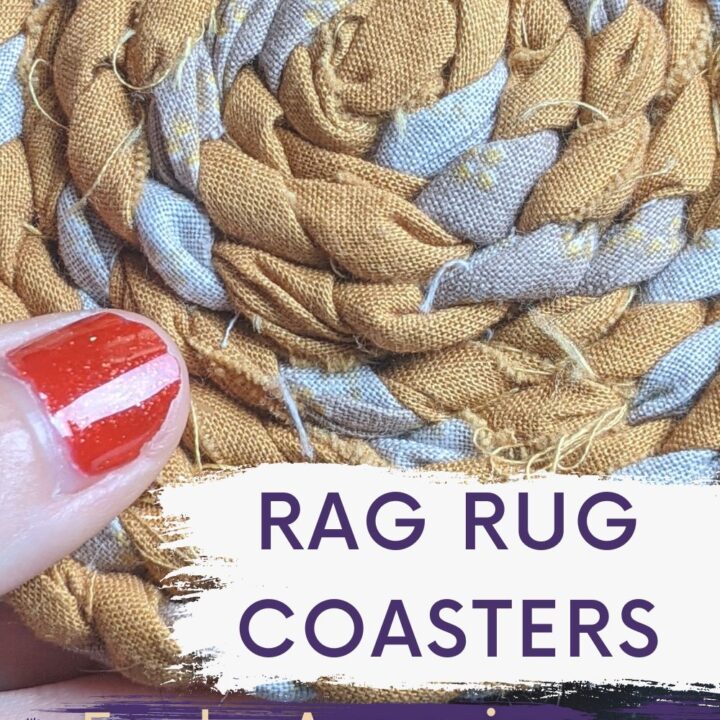 Close up of a hand holding a mini rag rug, coaster size. Mustard brown and off white fabric braid.